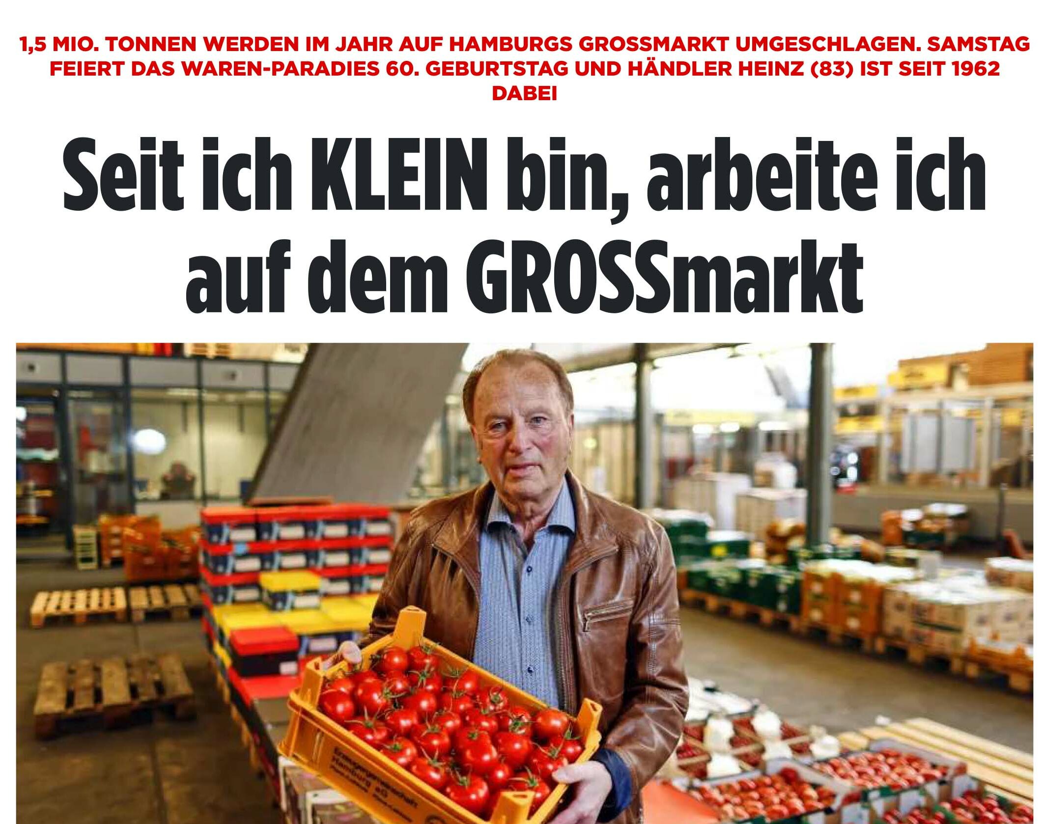Großhändler Heinz Reimers mit einer Kiste Tomaten